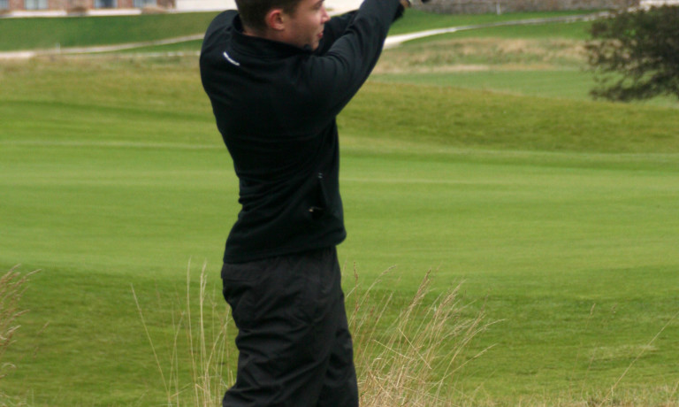 Rubber Duckie III teeing off at the 13th